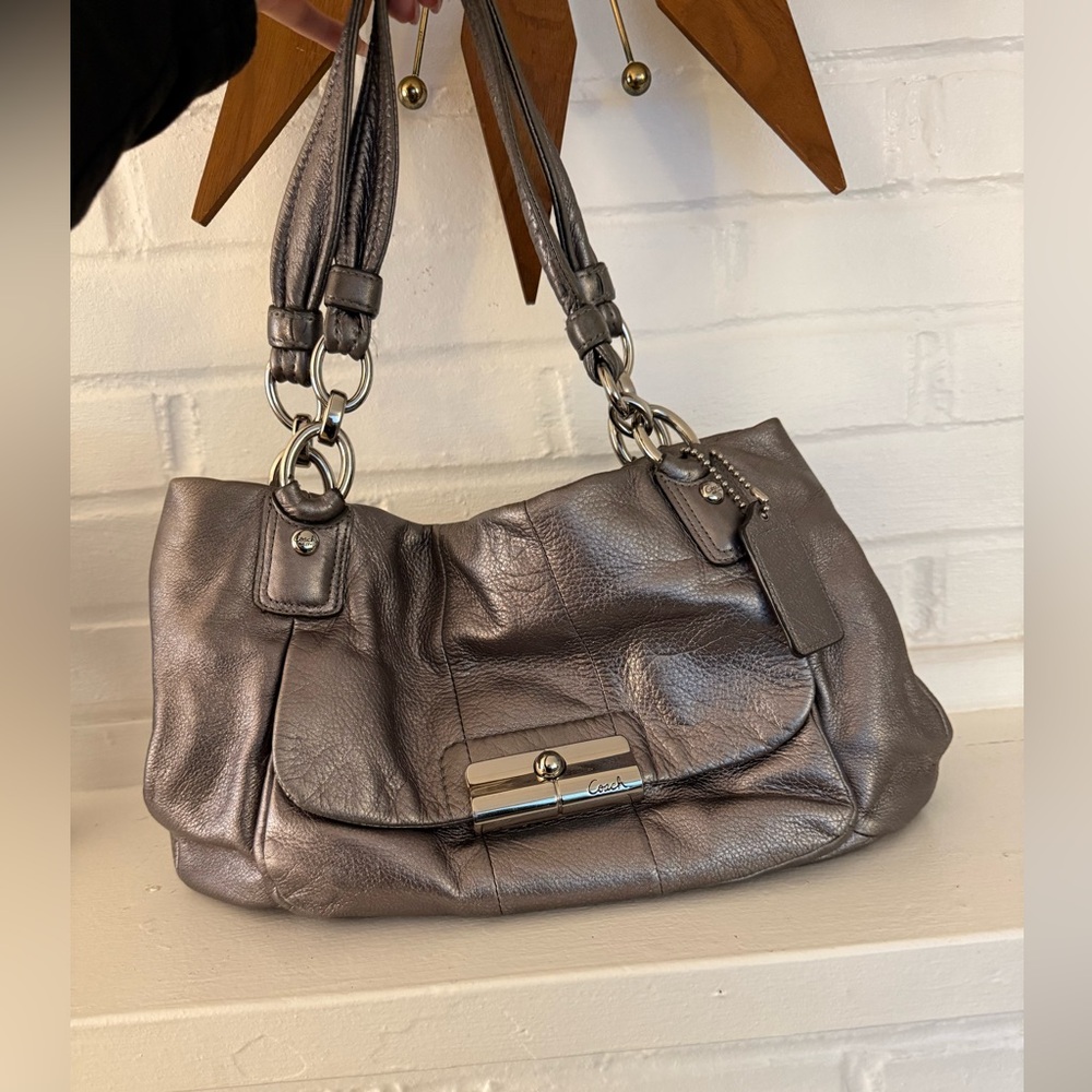 Silver coach purse